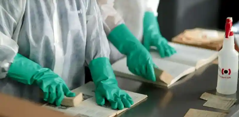 using sponges to clean documents