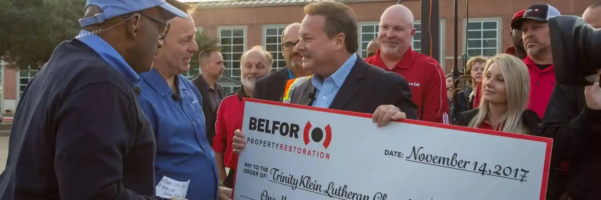 BELFOR CEO Sheldon Yellen Presents Check For Hurricane Impacted Communities