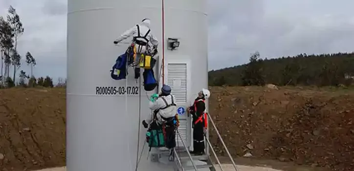 BELFOR team cleaning wind turbine